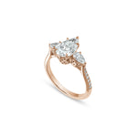 Pear-Shaped Lab-Grown Diamond Three-Stone Engagement Ring in Rose Gold Side View
