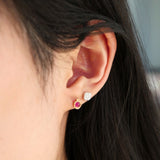 Pomegranate Faceted Cabochon Ruby Mini Stud Earrings on a Model