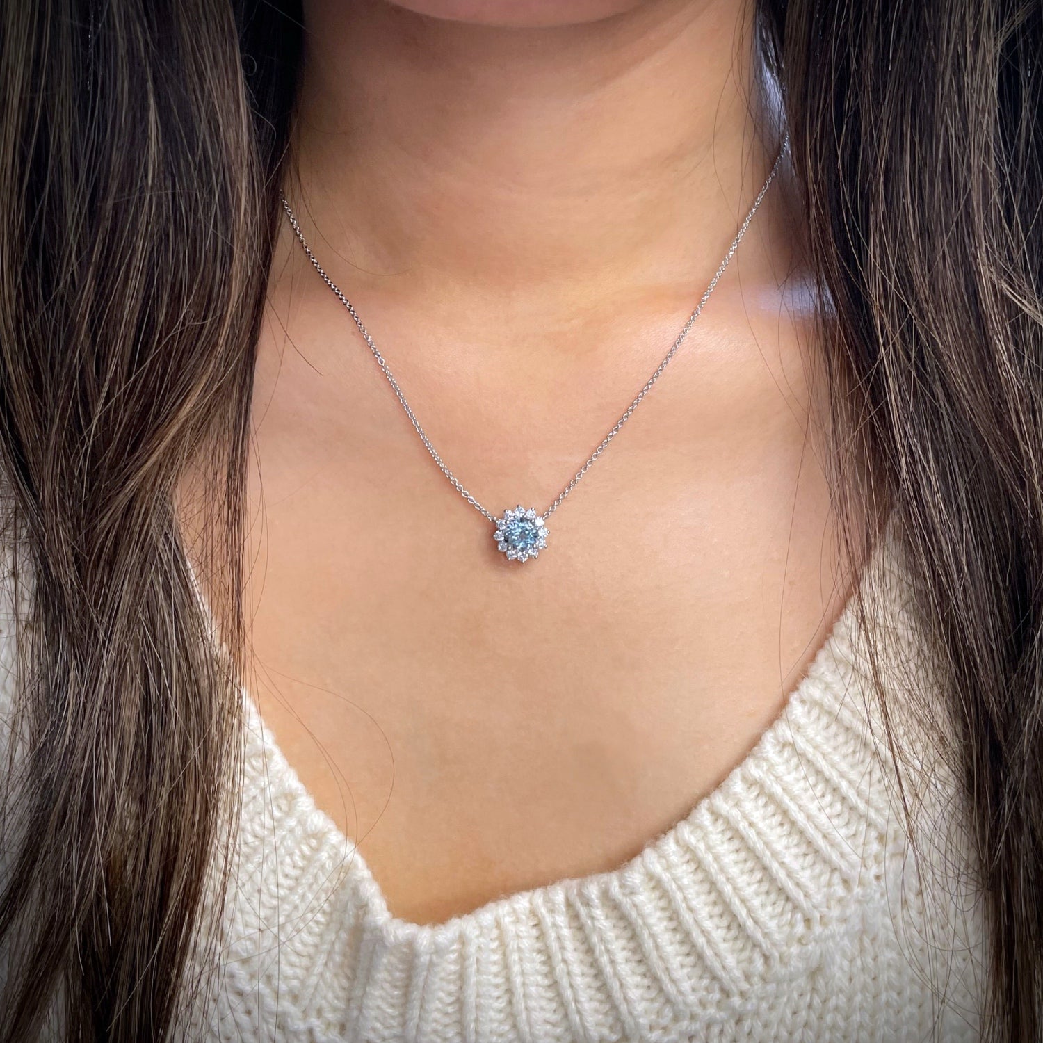 Round Aquamarine Diamond Floral Halo Necklace on a Model