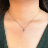 Round Brilliant Cut Diamond Cross Necklace on a Model