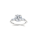 Round Brilliant and Baguette Cut Diamond Three-Stone Engagement Ring in White Gold