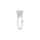 Round Brilliant and Baguette Cut Diamond Three-Stone Engagement Ring in White Gold Side View