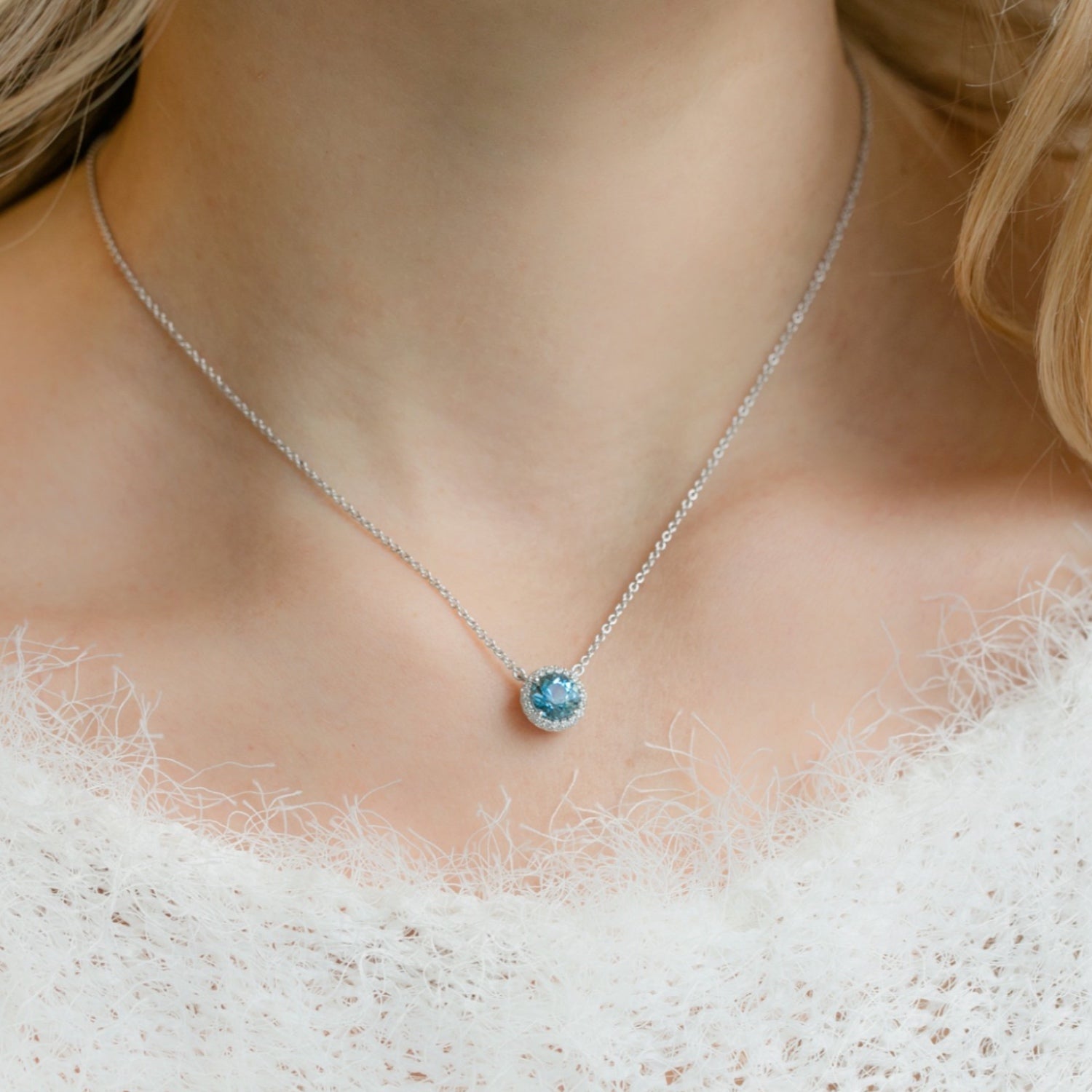 Round Cut Aquamarine Diamond Halo Necklace on a Model