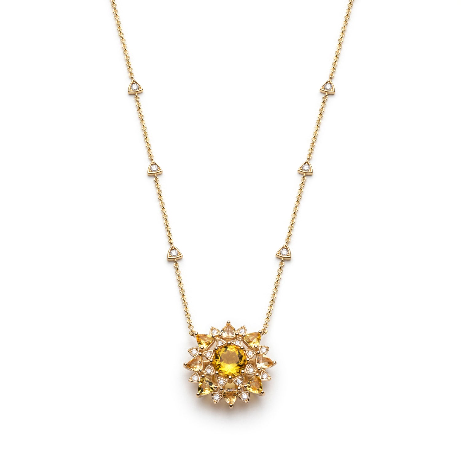 Chrysoberyl and diamond sunburst necklace in yellow gold with triangular diamond stations along the chain, front view.