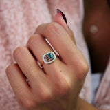 Elongated cushion cut paraiba-like watermelon tourmaline diamond halo east-west ring on hand