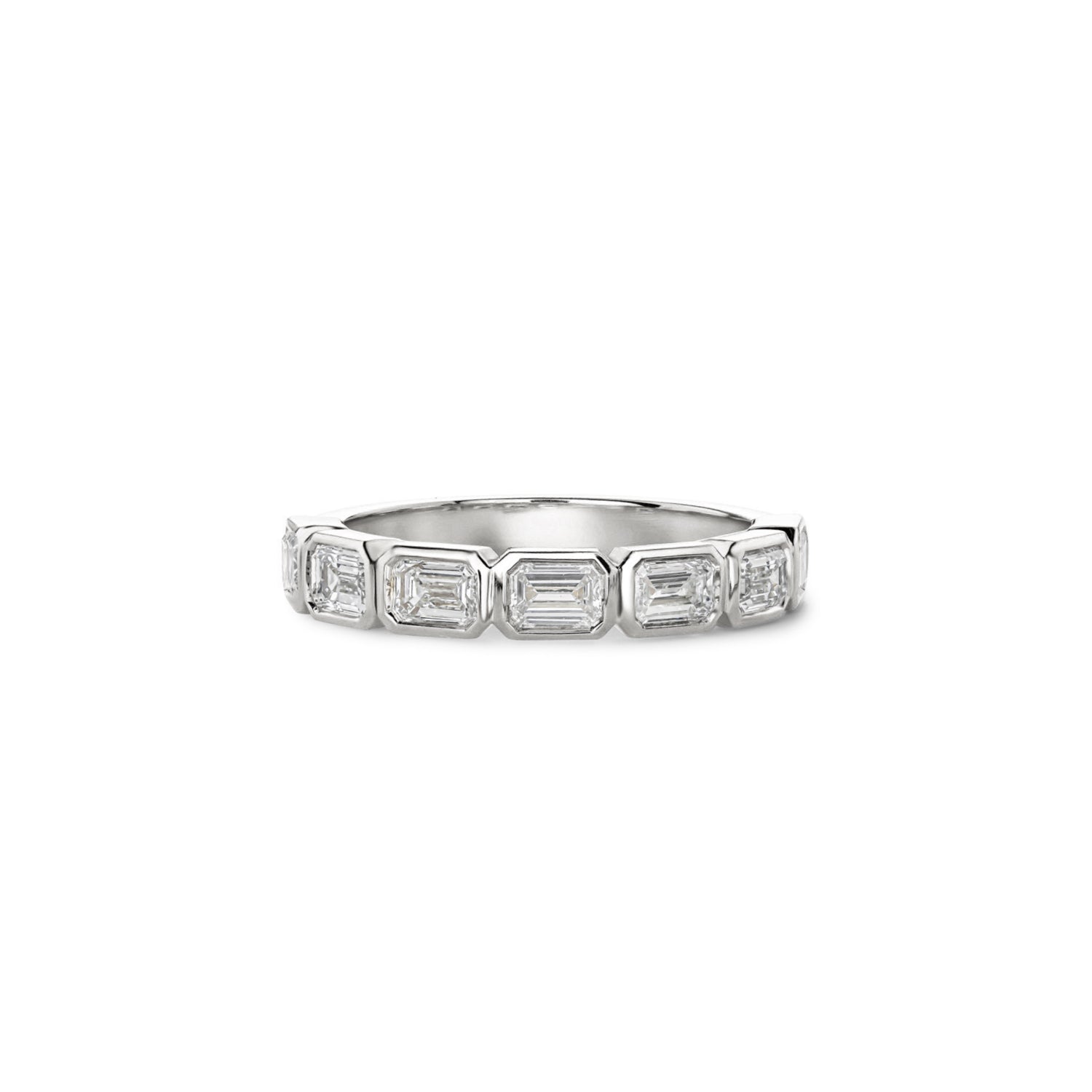 Emerald-cut lab-grown diamonds in white gold bezel settings across a half-eternity ring.