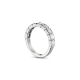 Side profile of an emerald-cut lab-grown diamond half-bezel half-eternity ring in white gold, showing the settings and polished band.
