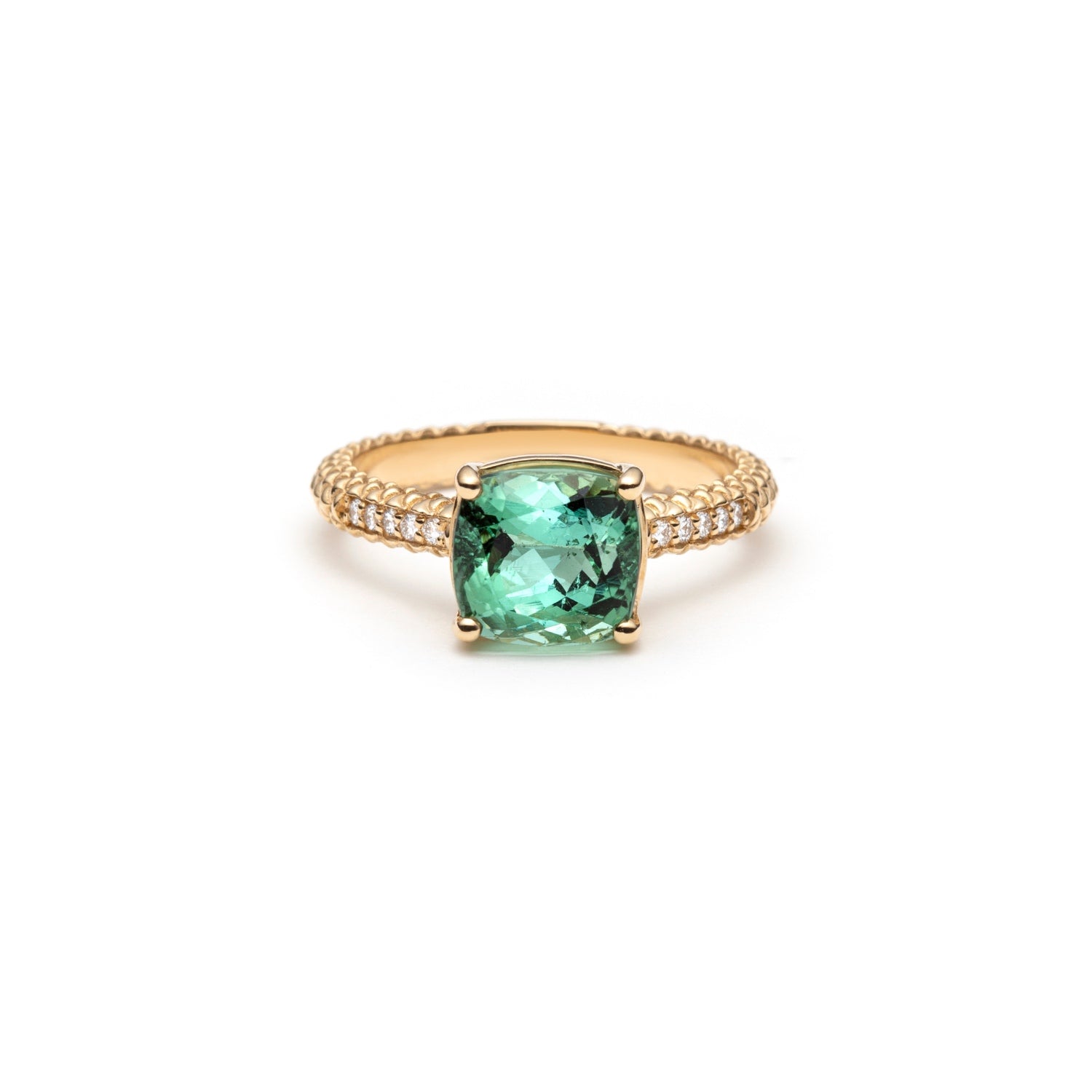 Lepia ring with a cushion-shaped green tourmaline set in 14K yellow gold.