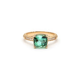 Lepia ring with a cushion-shaped green tourmaline set in 14K yellow gold.