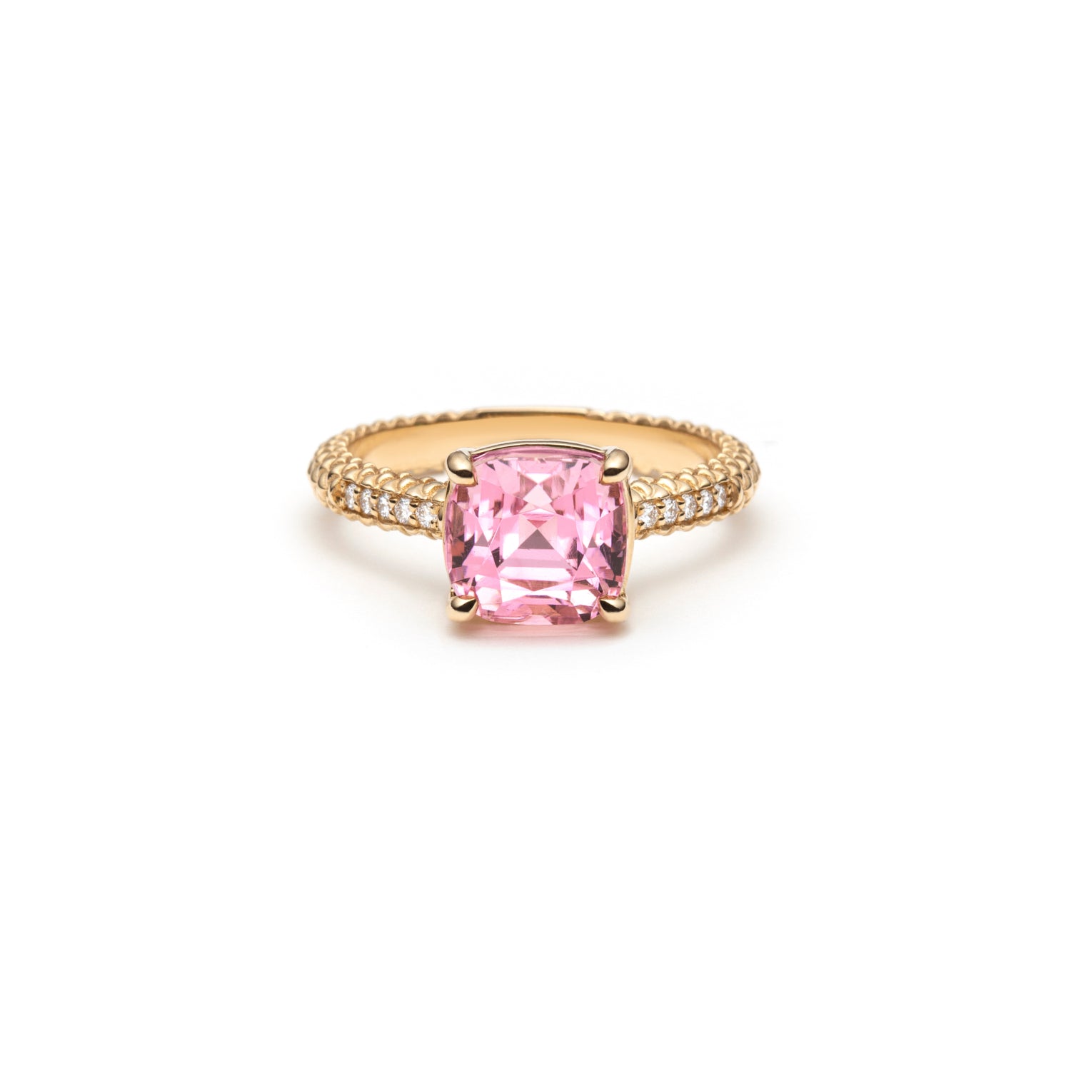 Lepia ring with a cushion-shaped pink tourmaline set in 14K yellow gold.