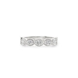 Oval-shaped lab-grown diamonds in white gold bezel settings across a half-eternity ring.