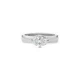 Oval-shaped lab-grown diamond set east-west in a white gold engagement ring with a wide polished band.