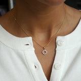 Step motif diamond pavé pendant necklace worn on neck